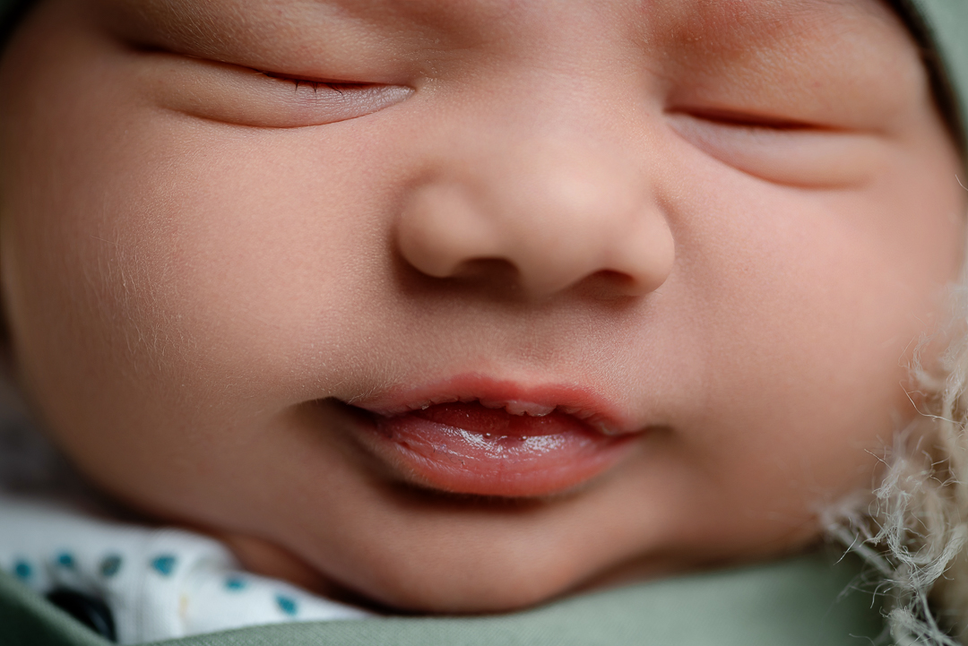 Newborn baby photographed during an in-studio session near New Richmond, WI