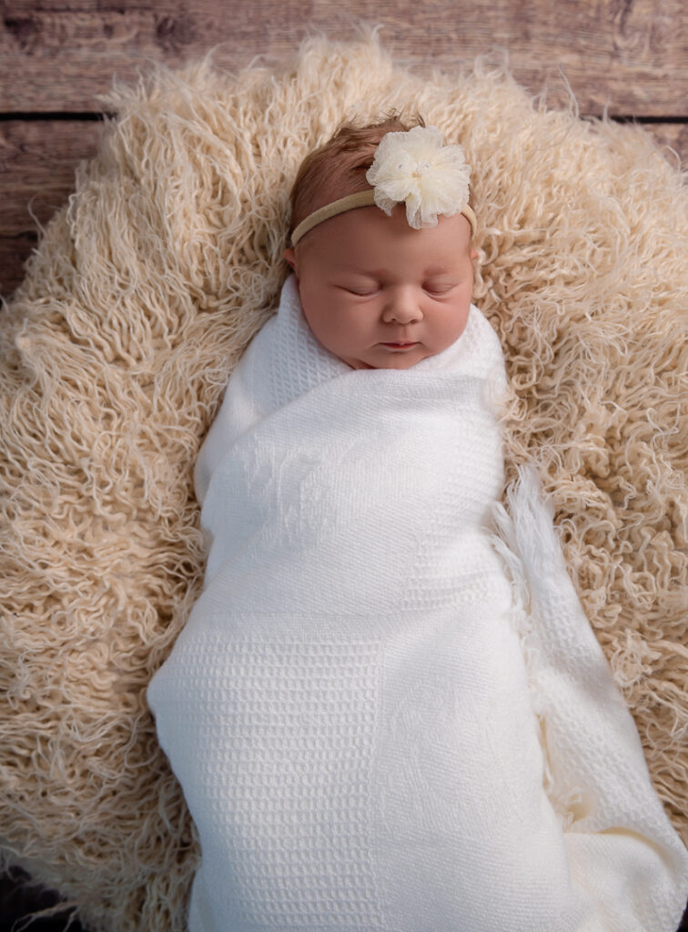 Swaddled baby girl