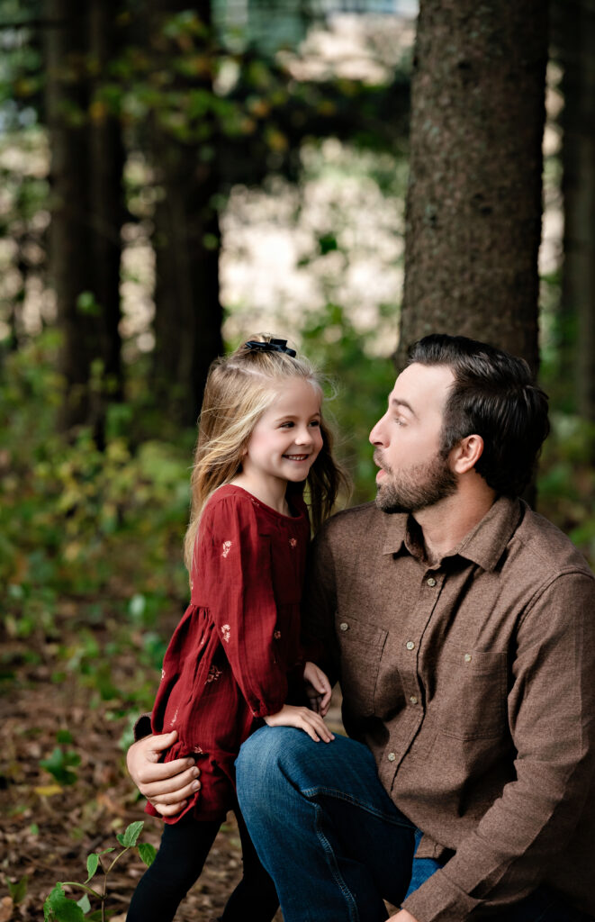 Authentic family moments captured during newborn photography session in downtown New Richmond