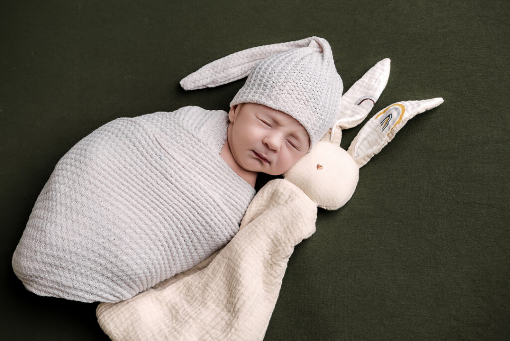 Mandie from Alabaster Photos preparing The Croix Studio for newborn and family photography sessions in New Richmond Wisconsin