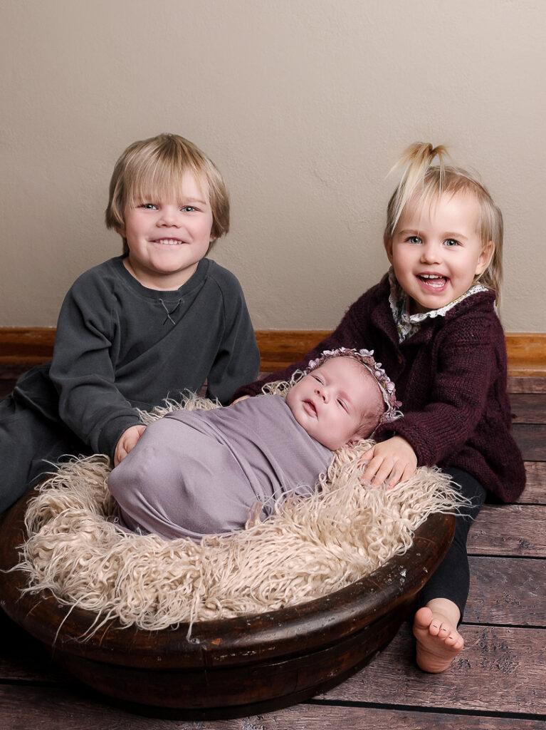 Soft natural tones and textures in newborn studio session, Wisconsin newborn photographer minimalist editing style
